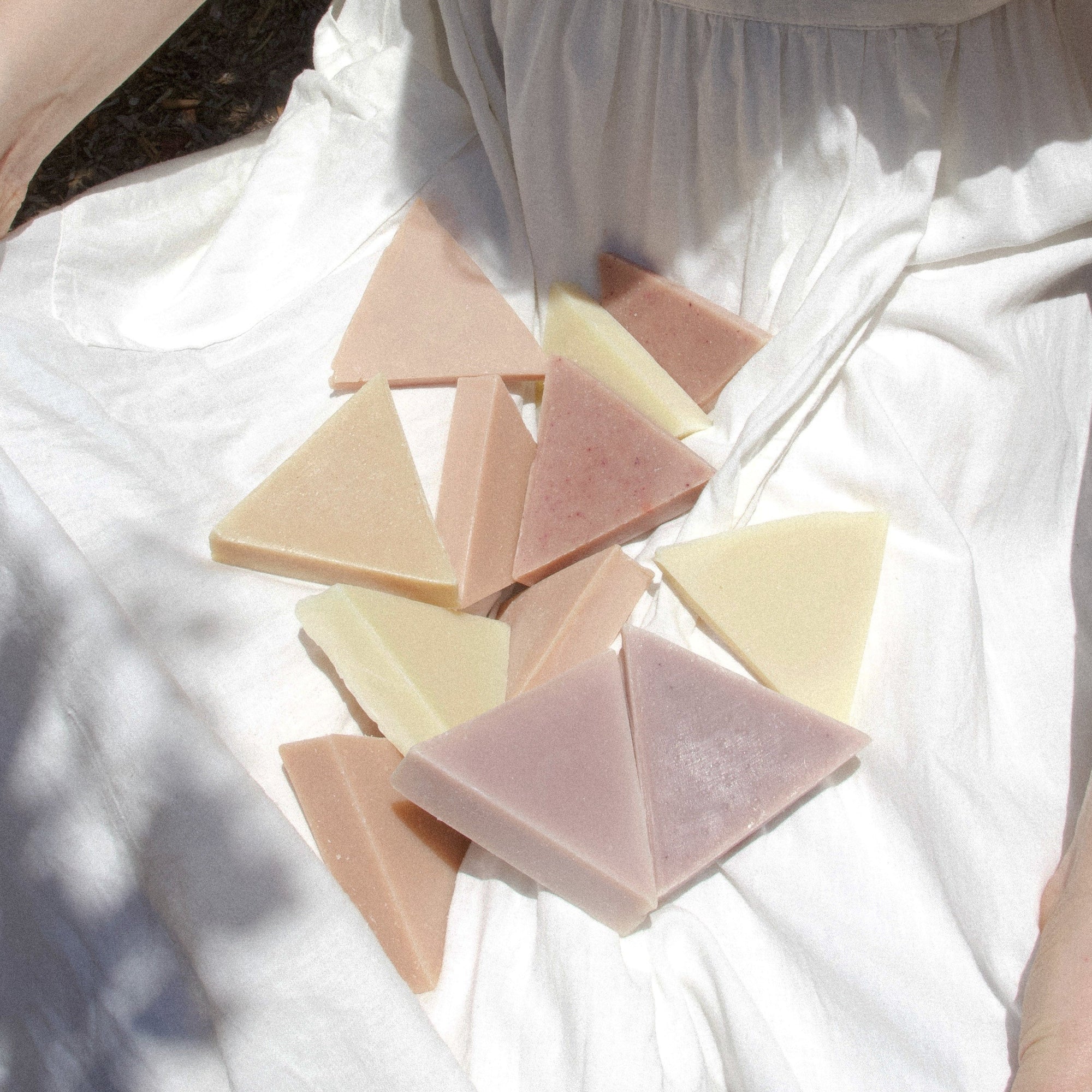 Soap ends piled up in a white dress